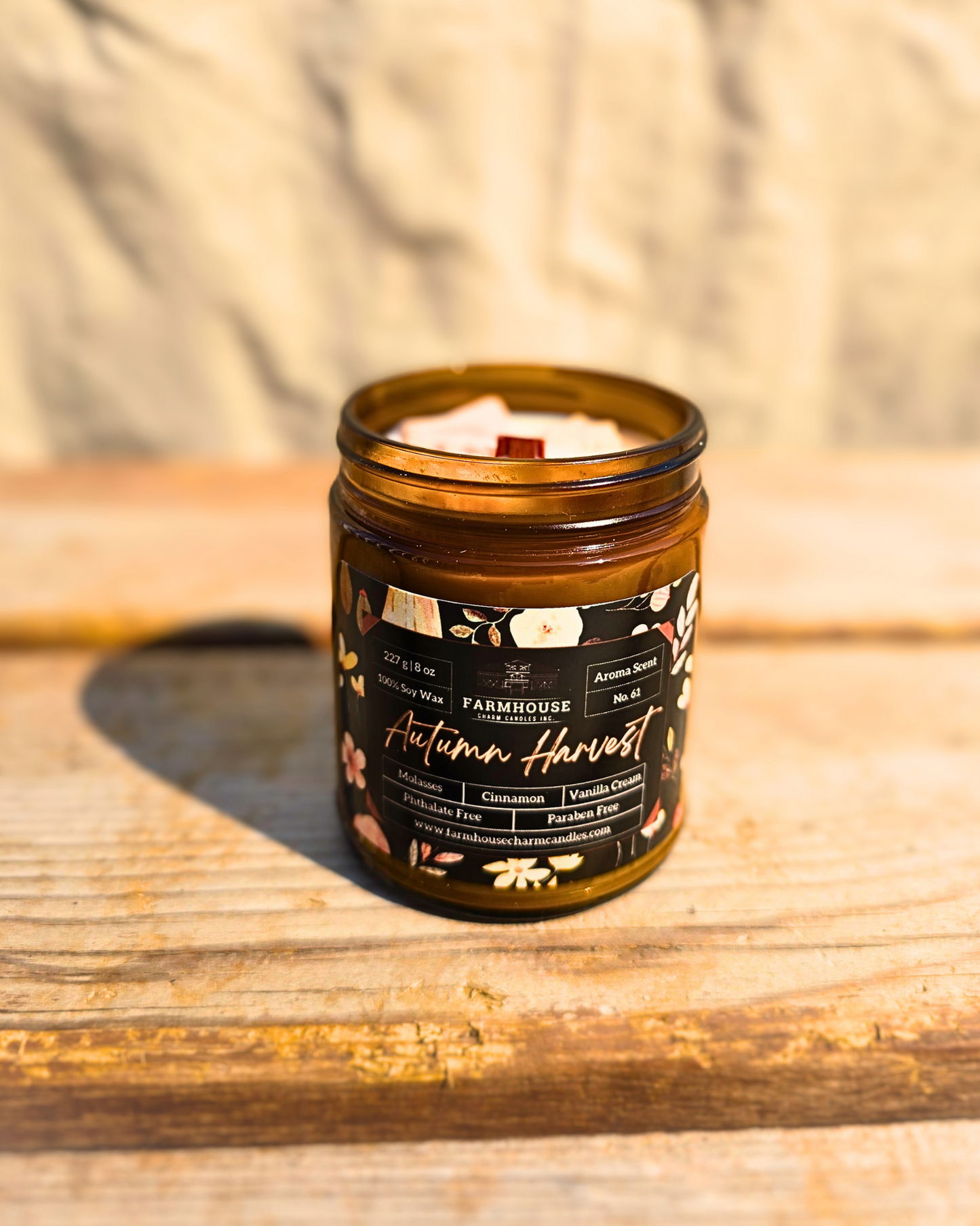 Embrace the cozy essence of fall with our Autumn Harvest Farmhouse Charm Candle. This meticulously crafted candle captures the heartwarming aroma of the season, blending rich molasses, spicy cinnamon, and creamy vanilla to create a scent that's both comforting and inviting. www.farmhousecharmcandles.com