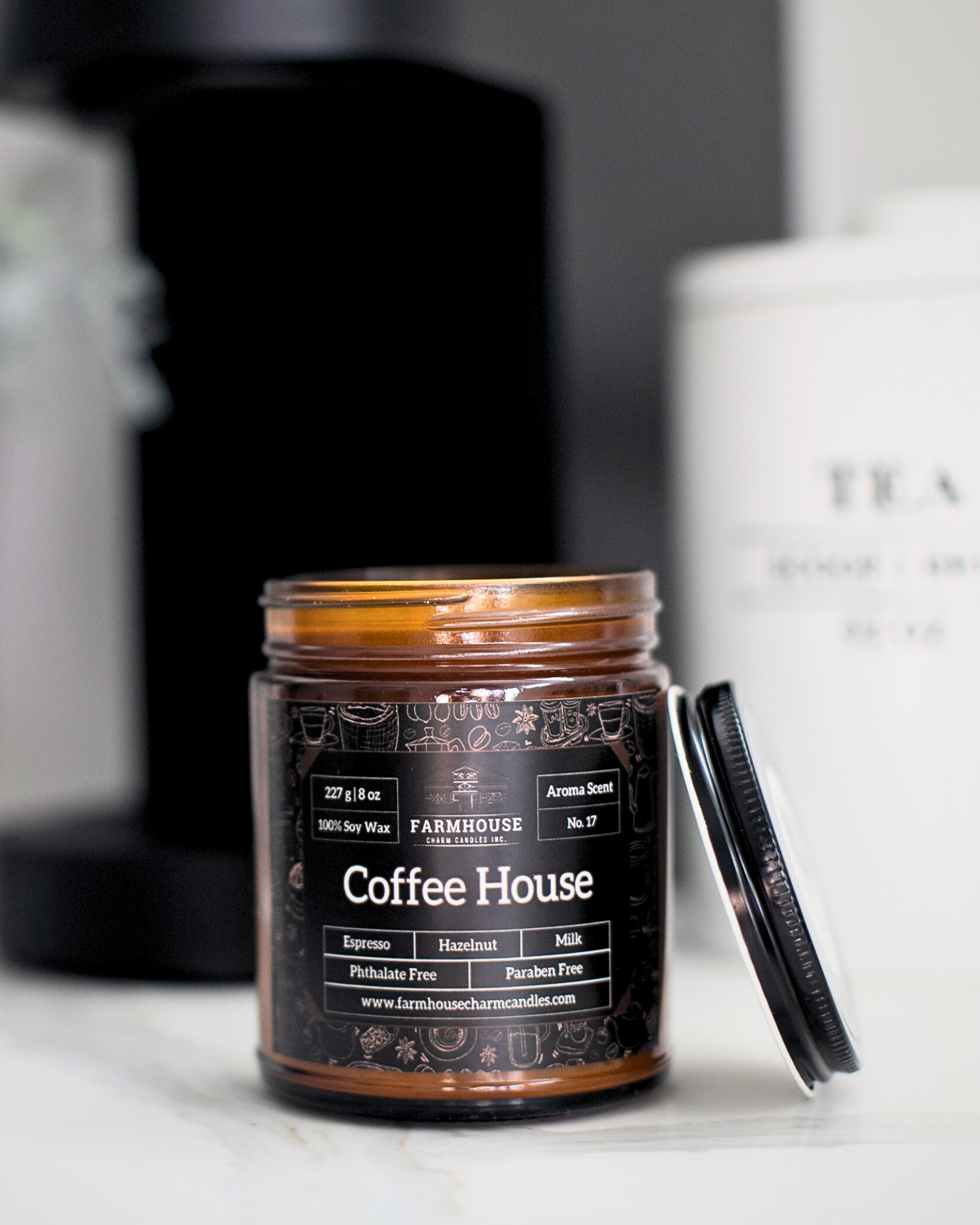 Calling all coffee lovers! If the smell of coffee brewing in the morning is your kind of nostalgia, then Aroma Scent No. 17 Coffee House Soy Candle is a must-try.  Imagine waking up to the rich aroma of a medium-dark roast, complemented by hints of hazelnut, caramel and warm milk. It's like a warm hug for your senses. This candle isn't just about waking up; it's about creating a cozy, welcoming vibe in your home that makes every moment feel special. www.farmhousecharmcandles.com