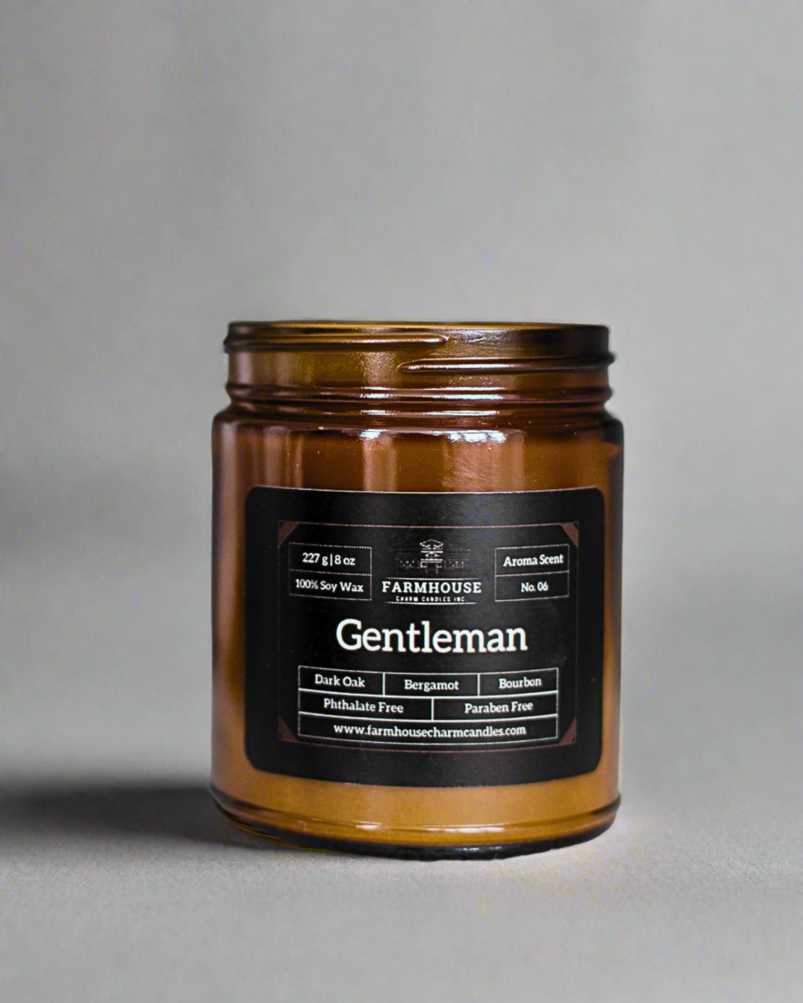 Ignite your senses with the Gentleman Soy Candle - Aroma Scent No. 6, a smooth and irresistible fragrance crafted to embody the essence of a true gentleman.  This soy candle features a powerful blend of dark oak, bergamot, and a dash of bourbon, creating an unforgettable aroma that will fill your home with sophistication and charm.  Rich Dark Oak: Brings the wilderness right into your living room. Lively Bergamot: Adds a burst of citrus freshness. Subtle Bourbon  www.farmhousecharmcandles.com