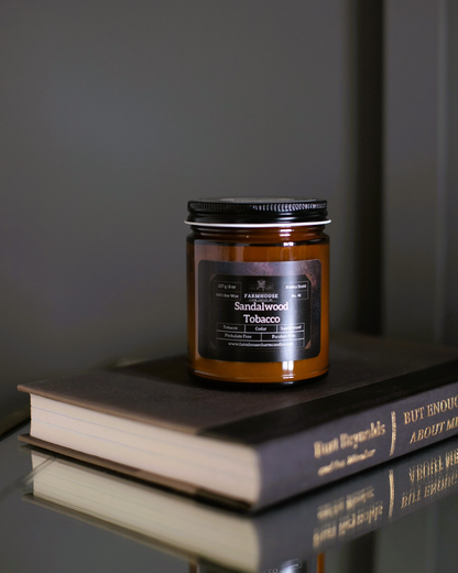 Transport yourself to cozy evenings by the fireplace with our Sandalwood Tobacco Soy Candle. It's like wrapping yourself in a warm blanket of nostalgia. The blend of tobacco leaf and cedar gives off a rich, musky aroma that's reminiscent of simpler times. With a hint of sweet sandalwood and a touch of earthy moss, it's the perfect scent for creating a relaxed and inviting atmosphere. www.farmhousecharmcandles.com