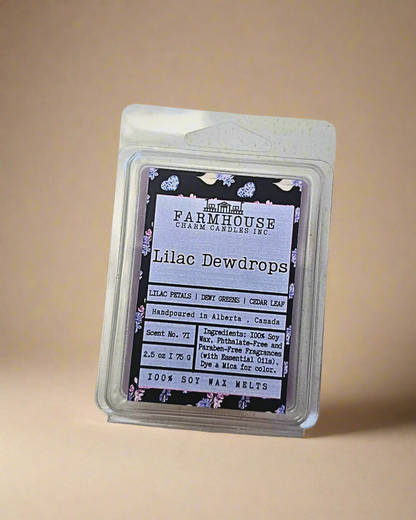 A delicate blend of lush lilac petals, crisp dewy greens, and a hint of cedar leaf for a subtle, woodsy finish. Fresh, floral, and oh-so-inviting! Lilac Dewdrops Soy Wax Melts - Farmhouse Charm Candles