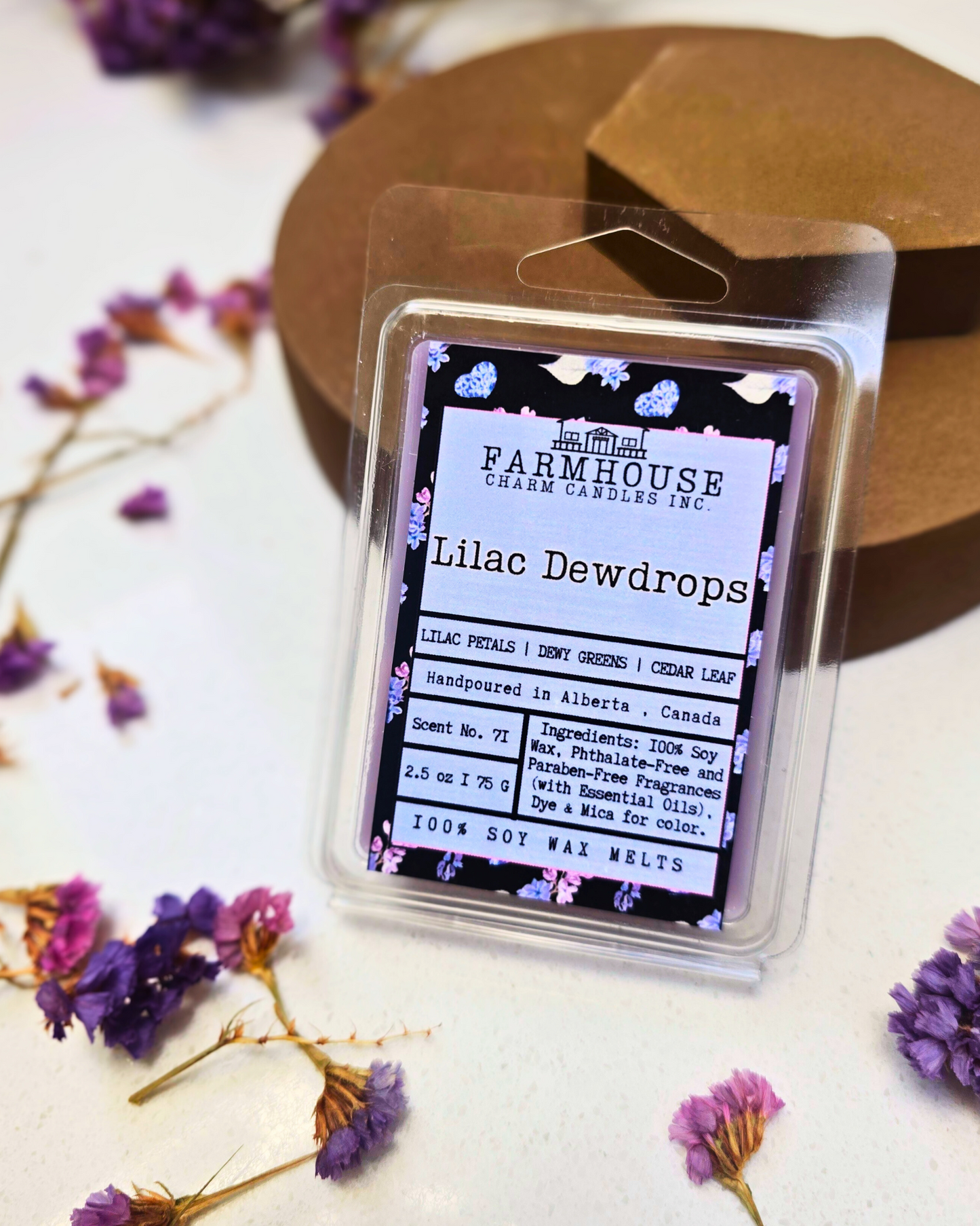 A delicate blend of lush lilac petals, crisp dewy greens, and a hint of cedar leaf for a subtle, woodsy finish. Fresh, floral, and oh-so-inviting! Lilac Dewdrops Soy Wax Melts - Farmhouse Charm Candles