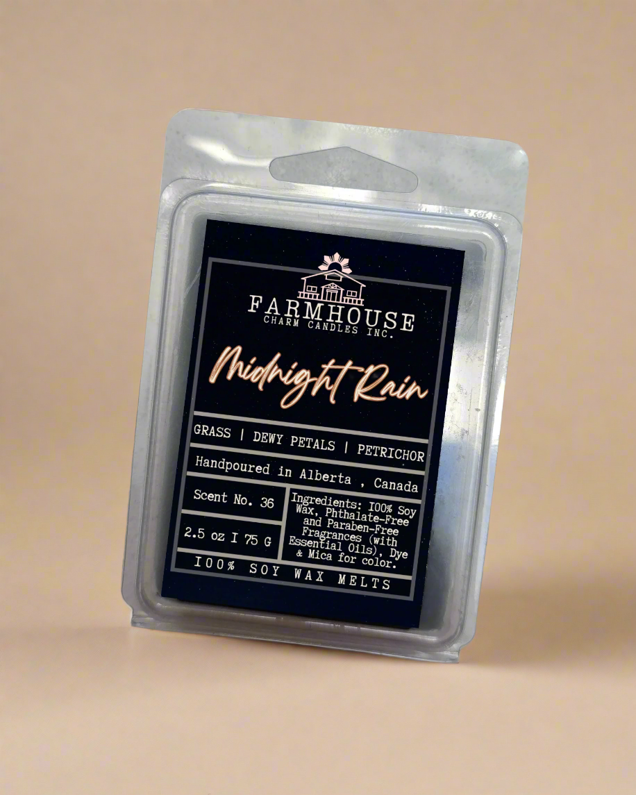 Experience nature’s clean slate with dewy grass, soft florals, and that unmistakable, soothing petrichor—the scent of rain on warm earth. Crisp. Grounding. Refreshing. Midnight Rain Soy Wax Melts - Farmhouse Charm Candles