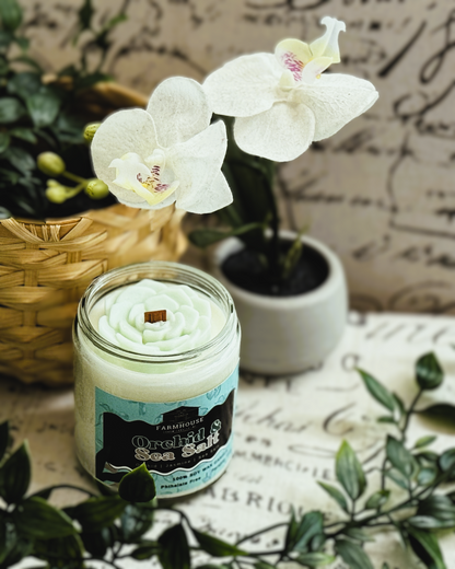 Step back into a world where every scent tells a story. Our Orchid & Sea Salt Soy Candle - Aroma Scent No. 15 will transport you to cherished moments by the sea, mingled with the sweet memories of blooming gardens. Imagine the soft floral notes of orchid, jasmine, and lily filling your home, combined with the crisp and refreshing sea salt mist. It's an elegant yet invigorating fragrance that brings the best of nature into your living space. www.farmhousecharmcandles.com