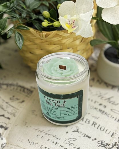 Refreshing blends of floral elegance of orchid and jasmine, kissed by the crisp, clean notes of sea salt. Topped with charming light green succulent wax embeds, it’s a mini oasis in a jar. Orchid & Sea Salt Soy Candle-Farmhouse Charm Candles