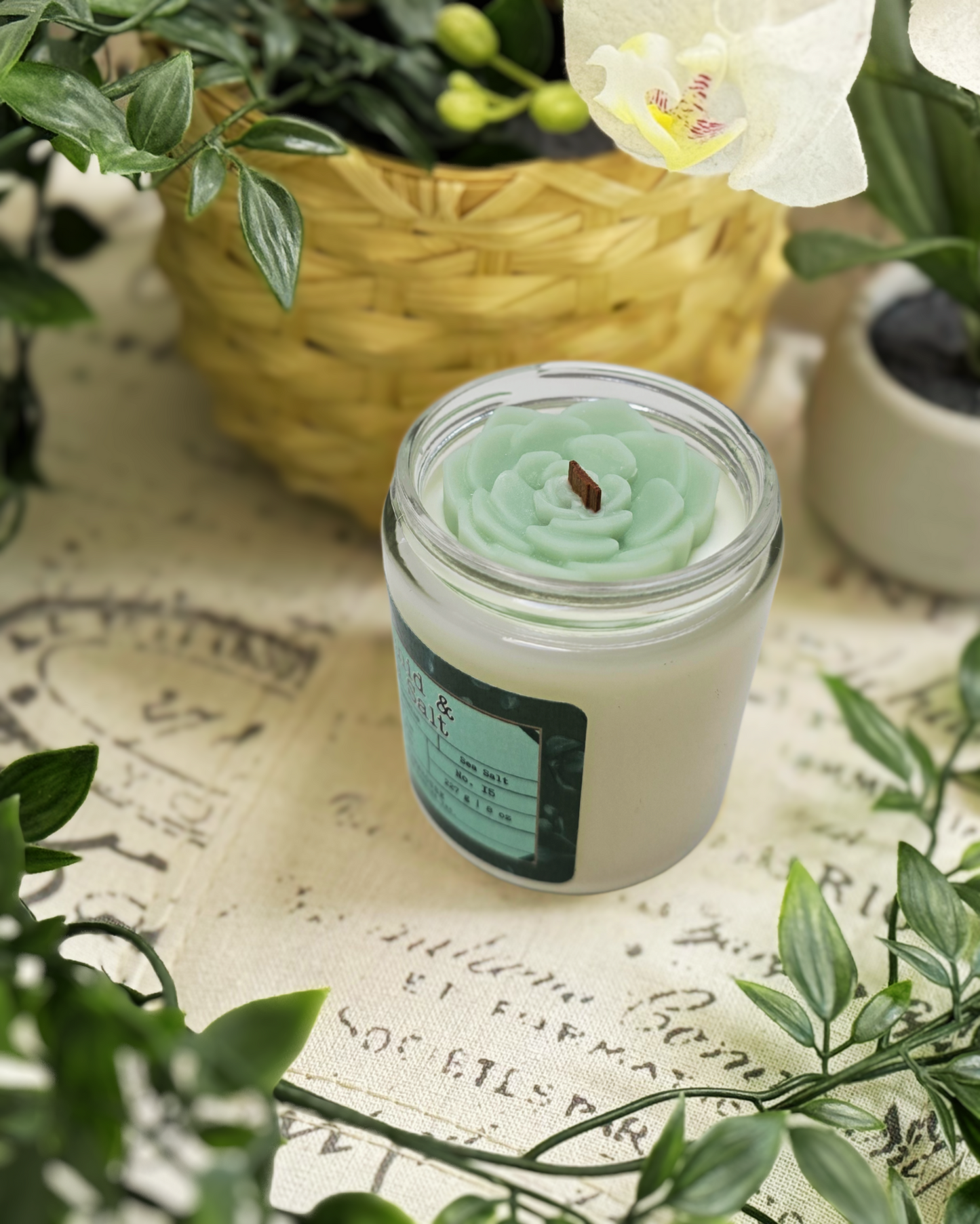 Refreshing blends of floral elegance of orchid and jasmine, kissed by the crisp, clean notes of sea salt. Topped with charming light green succulent wax embeds, it’s a mini oasis in a jar. Orchid & Sea Salt Soy Candle-Farmhouse Charm Candles