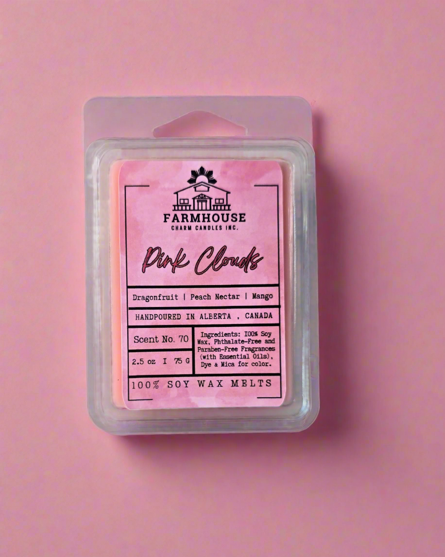 Farmhouse Charm Candles. Ready to turn your home into a pink-sky paradise? Inspired by the whimsical beauty of pink skies at dawn, these melts are infused with a vibrant blend of dragon fruit, peach nectar, and mango. The fruity, uplifting scent wraps your home in a warm, inviting embrace, evoking the magic of life's sweetest moments. Let the delightful fragrance spark your imagination and transport you to a serene, dreamlike escape. Perfect for setting a calming mood or celebrating joyful days.