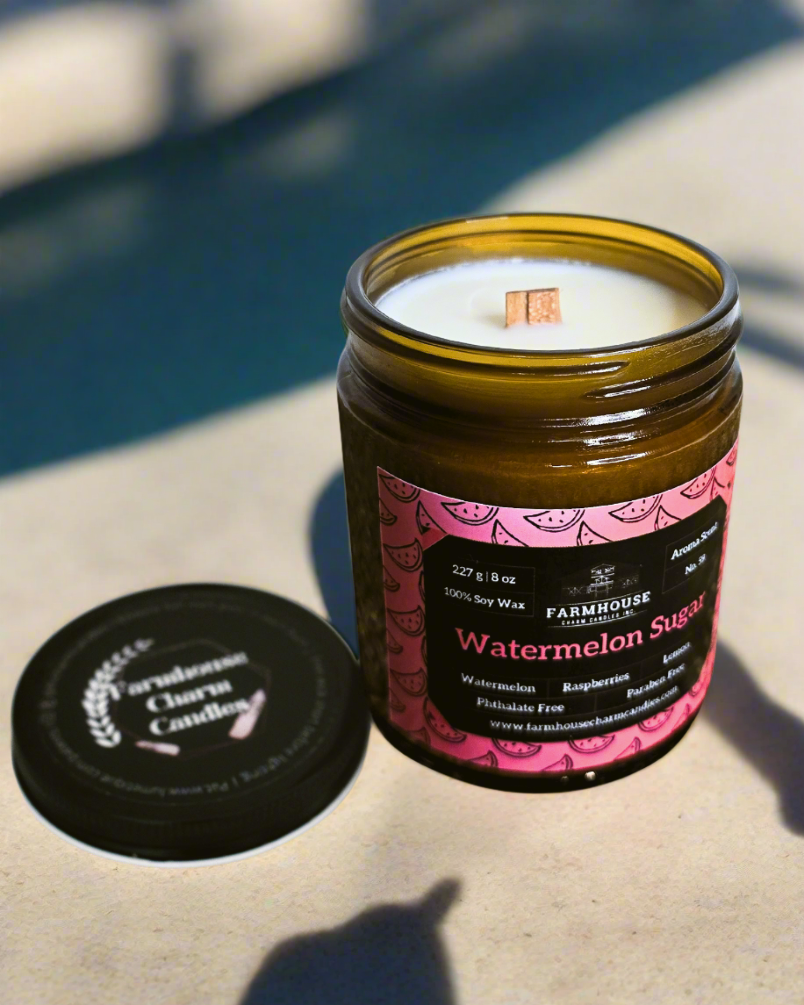 Relive the sweet memories of summer with our newest blend - the Watermelon Sugar Soy Candle - Aroma Scent No. 59! This delightful candle is a perfect mix of juicy watermelon, sweet raspberries, and zesty lemon, whisking you away to sunny days and cool, refreshing treats. It’s like tasting strawberries on a warm summer evening and hearing your favorite song. You’ll crave more of those summer vibes with its wonderful, warm glow. www.farmhousecharmcandles.com