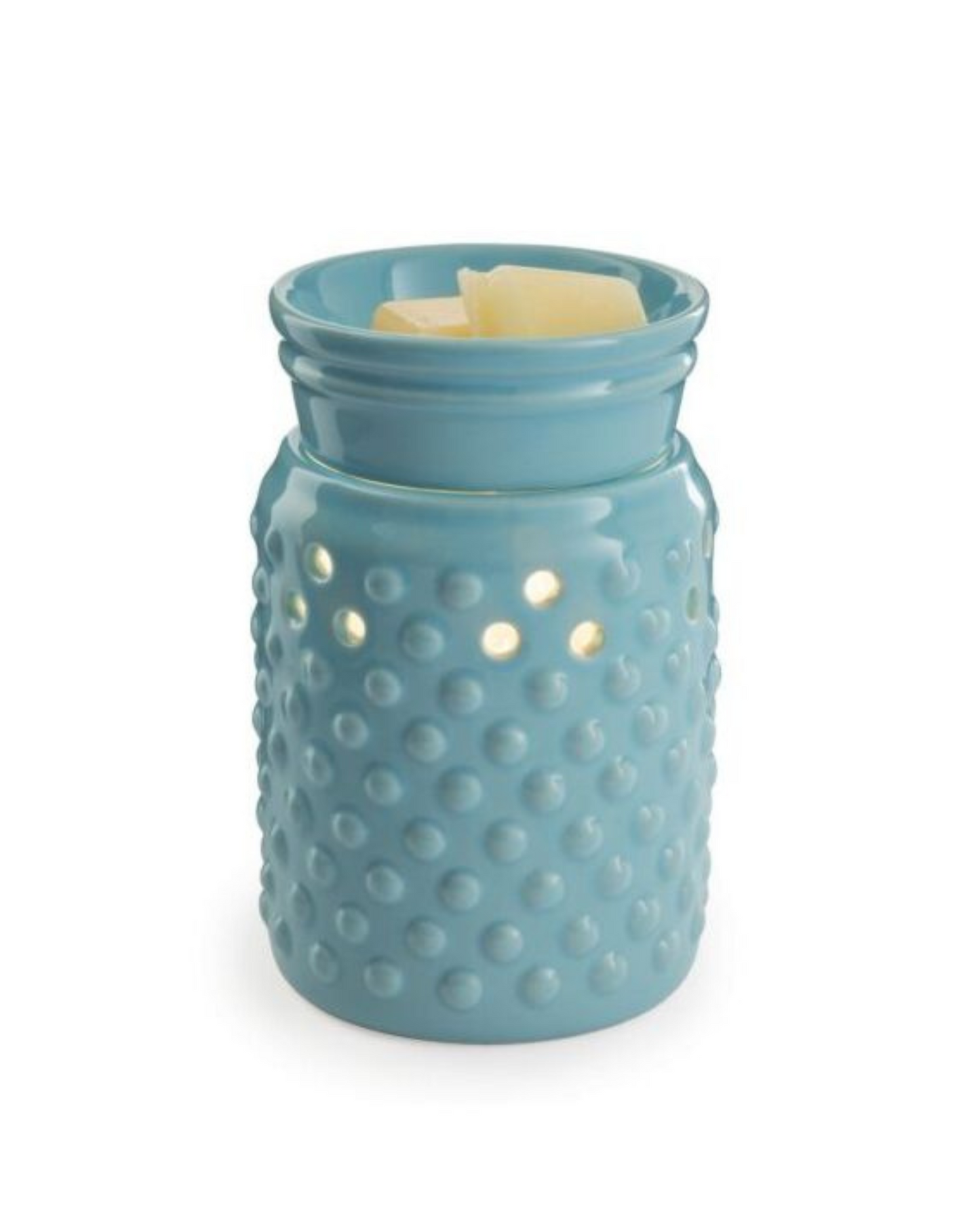 A sky blue glaze and hobnail pattern lets this versatile warmer go with either modern or traditional decor. The Midsize Illumination from Candle Warmers Etc. is a slightly smaller and more economical warmer. A perfect fit for cozier spaces in your home, this decorative fragrance warmer safely warms scented wax melts, releasing lasting fragrance throughout any room. Styled for your home, be it farmhouse or traditional or modern!